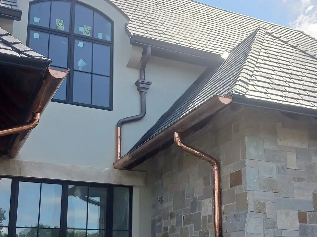 How Does Copper Gutter Installation Enhance a Luxury Home in South Tampa, FL?